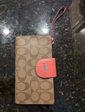Coach Brown Signature Canvas Phone Wristlet with Pink Leather Snap